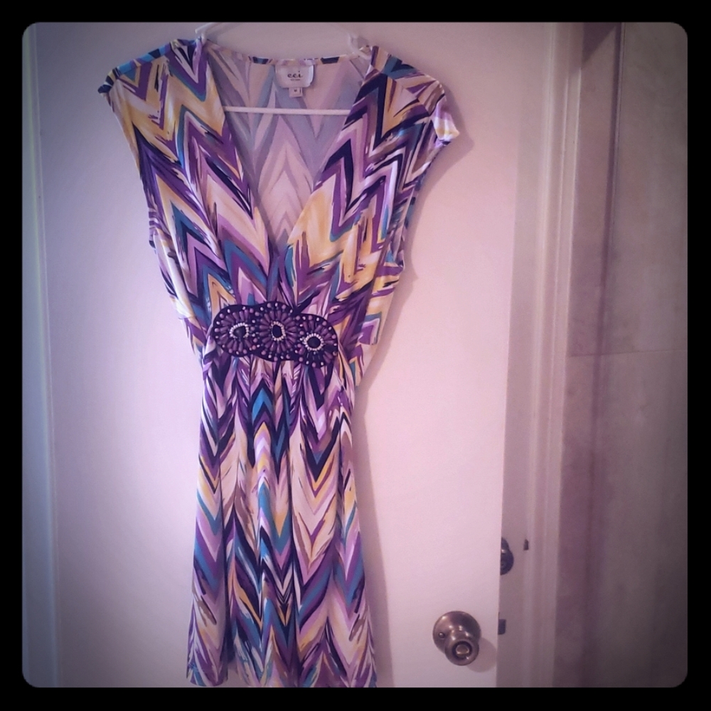 Boutique plunging neck mini dress w bead detail